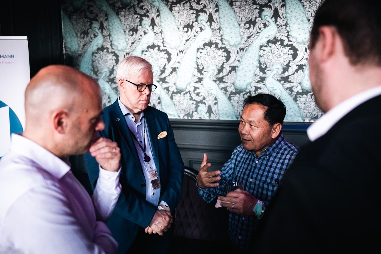Senator Mardi Seng in conversation with international colleagues